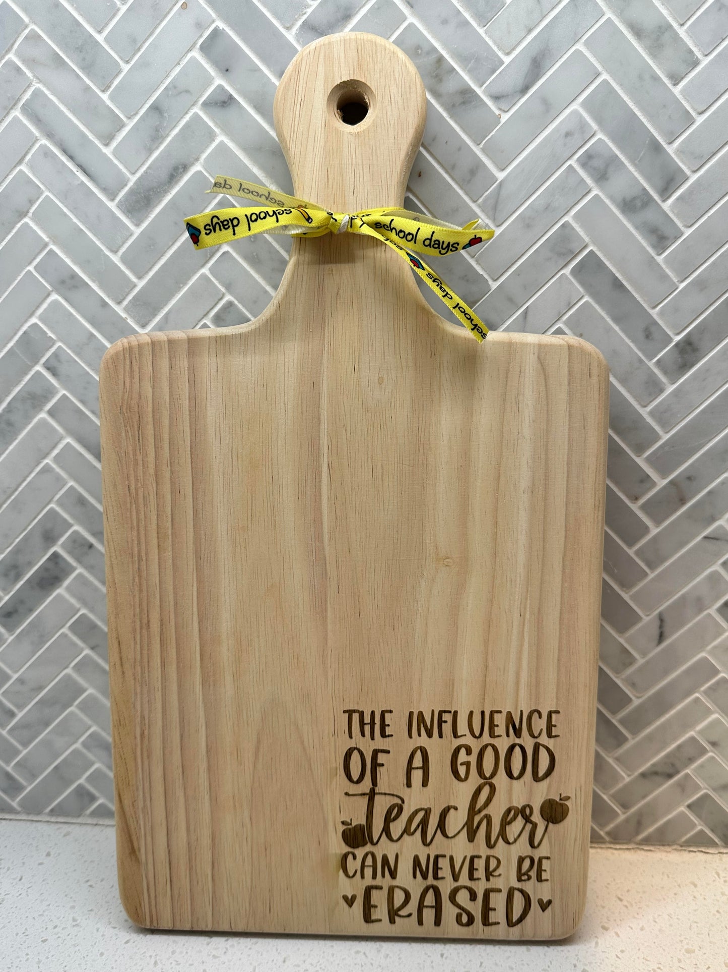 "The Influence of a Good Teacher Can Never Be Erased" Board